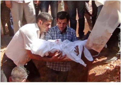 Abdullah entierra al pequeño Aylan en Cementerio de los Mártires / Reuters 