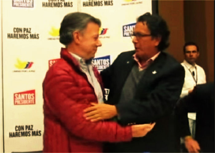 El abrazo de Santos al hermano de Alfonso Cano