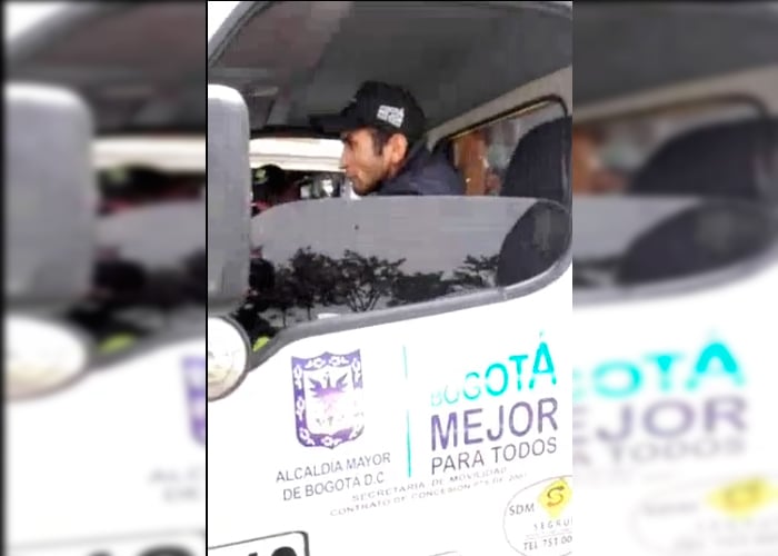 VIDEO: Conductor de grúa de Tránsito con pistola casi atropella dos policías en Bogotá