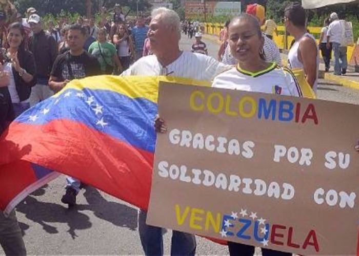 Acojamos a los venezolanos