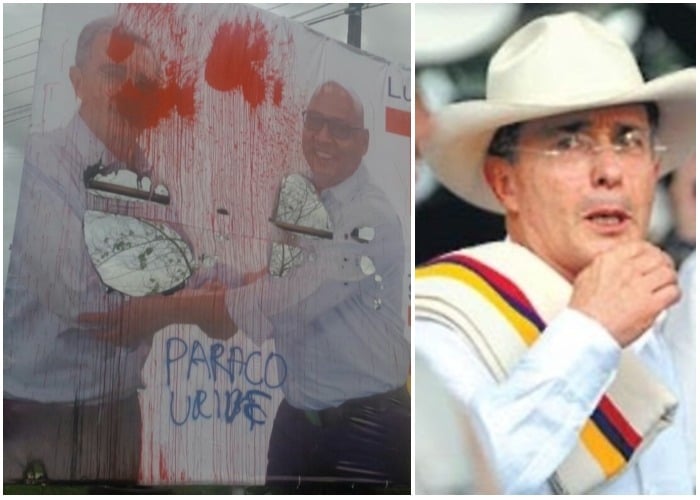 Rompen y rallan vallas de Álvaro Uribe: le escriben paraco con aerosol