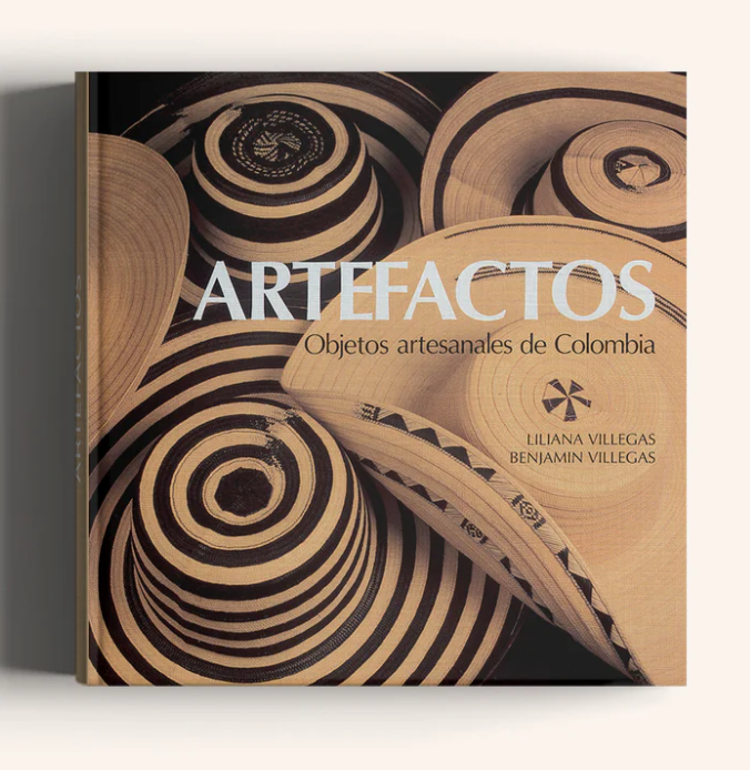 Book cover for Artefactos: Objetos artesanales de Colombia, by Liliana Villegas and Benjamin Villegas, showing woven straw hats in warm tones. - Los lujosos libros de Villegas Editores que ahora podrán estar al alcance de cualquier bolsillo