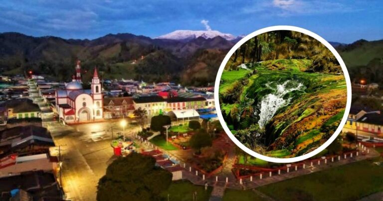 Aerial view of a small town at dusk with a lit central church and surrounding buildings; circular inset shows a lush waterfall scene. - Así puede llegar a la quebrada de colores en Tolima, un paraíso entre montañas y frailejones