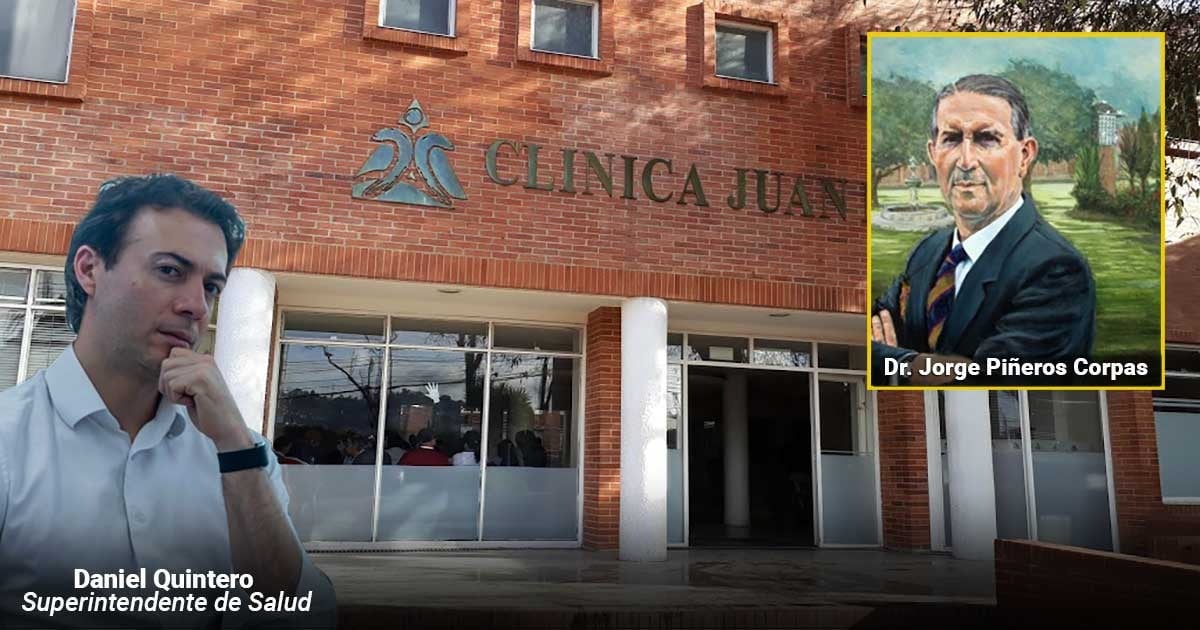 Man in white shirt, standing in front of Clinica Juan, with a framed portrait of Dr. Jorge Pif1eros Corpas on the right (overlayed). - Supersalud ordena medidas cautelares contra la Clínica Juan N. Corpas ante crisis por falta de pagos