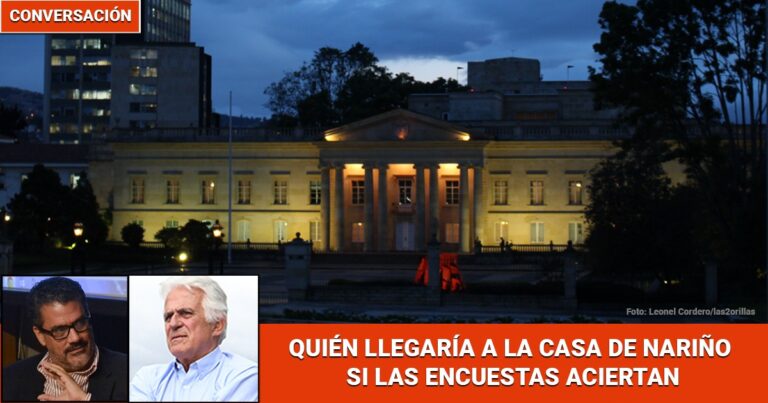 Exterior night view of a grand government building with an orange 'CONVERSACIÓN' banner and a red headline bar about Nariño, plus two guest portraits on the left. - Las2orillas.co: Historias, voces y noticias de Colombia