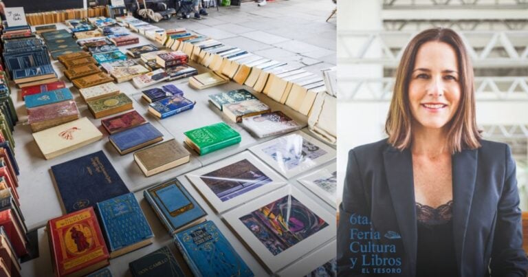 Las2orillas.co: Historias, voces y noticias de Colombia Rows of colorful books spread on tables at a street book market, with a smiling woman in a blazer standing beside a book-fair banner on the right. - Las2orillas.co: Historias, voces y noticias de Colombia