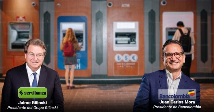 Two bank executives in suits stand in front of row of ATMs; left labeled Jaime Gilinski, Presidente del Grupo Gilinski (Servibanca), right labeled Juan Carlos Mora, Presidente de Bancolombia. - Las2orillas.co: Historias, voces y noticias de Colombia
