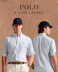 La pelea por la marca de las camisetas Polo que Ralph Laurent-Colombia terminó ganando Polo Ralph Lauren advertisement showing two men in blue-and-white striped shirts and navy caps against a tan background. - La pelea por la marca de las camisetas Polo que Ralph Laurent-Colombia terminó ganando