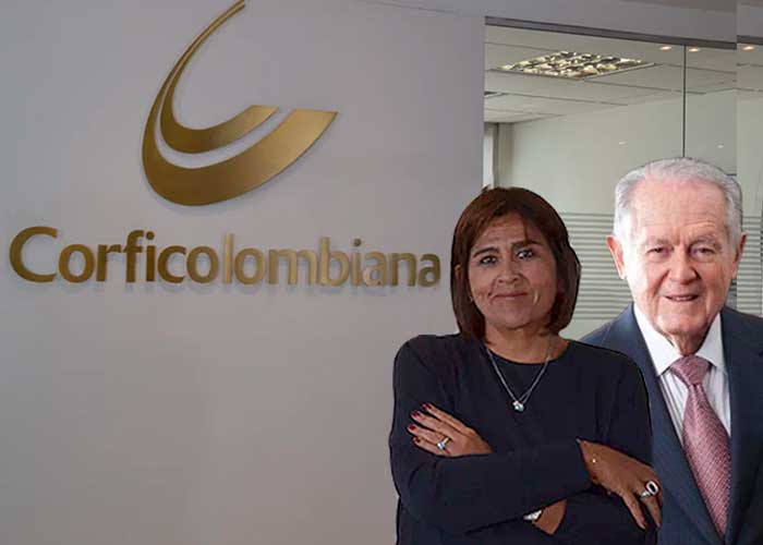 Panamá, el nuevo escenario de negocios de Luis Carlos Sarmiento Angulo a donde trasladó del 52% de Corficolombiana Woman with arms crossed next to a life-size cardboard cutout of an older man, in front of a Corficolombiana logo. - Panamá, el nuevo escenario de negocios de Luis Carlos Sarmiento Angulo a donde trasladó del 52% de Corficolombiana