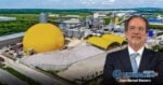 Promotional image of a cement factory with a large yellow dome and a man in a suit in the foreground, Ultracem Cemento branding. - Una pequeña planta cementera que nació en Galapa está volando y se consolida en Centroamérica