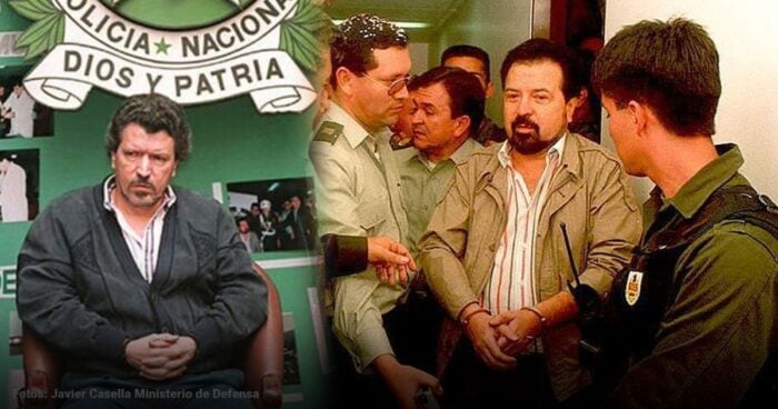 Serious-looking man seated left in a dark jacket while uniformed officers speak with a man in a beige jacket near a police banner reading 'Policia Nacional Dios y Patria'. - Los US 3.5 millones del Cartel de Cali que hicieron tambalear a un presidente colombiano y llegan a HBO