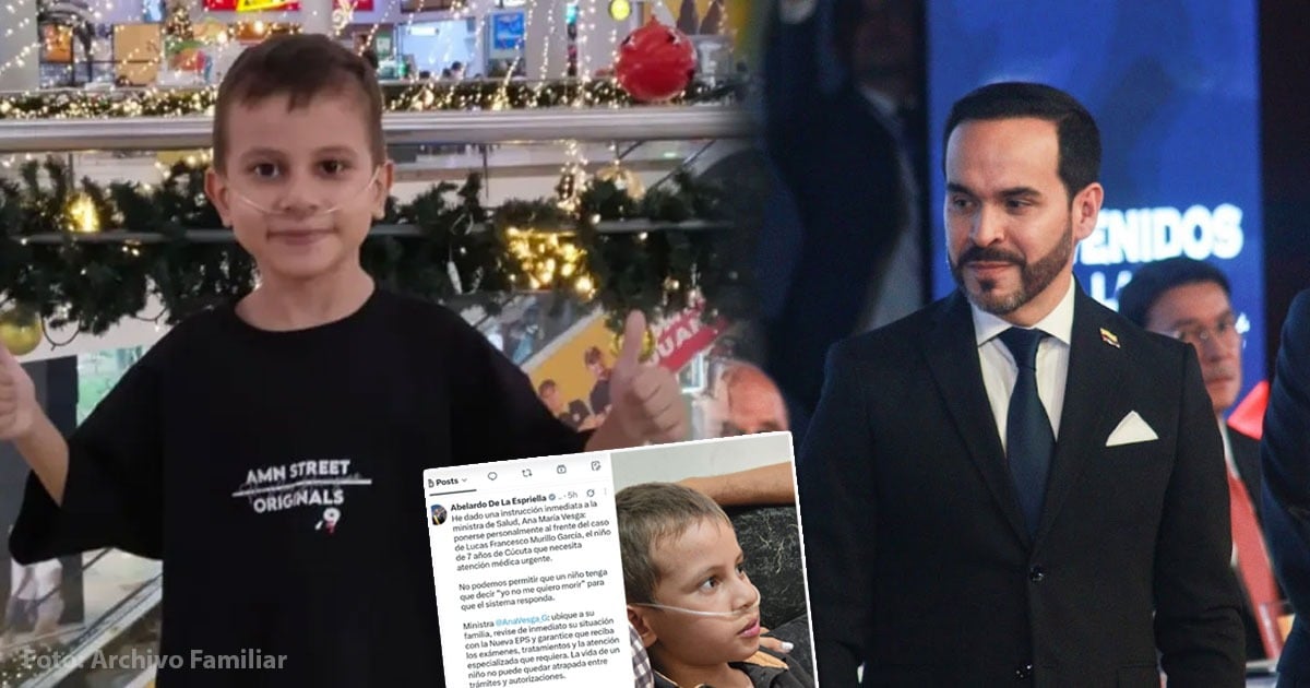 Boy with a nasal oxygen tube giving thumbs up in a Christmas-decorated mall, standing beside a man in a suit. - Jalón de orejas del presidente a Nueva EPS logra que un niño de siete años reciba la atención esperada durante un año
