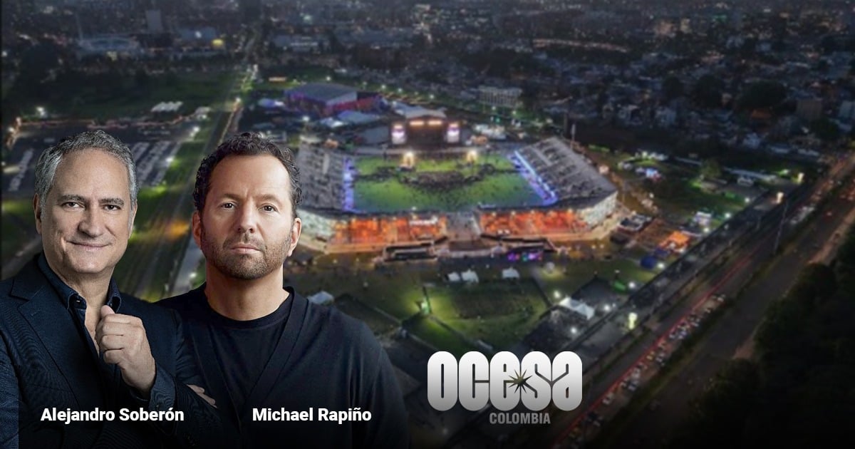Night aerial stadium scene with two men in the foreground left and a Colombia logo in the bottom center; labeled Alejandro Soberón and Michael Rapiño. - Las cifras récord que el mexicano Alejandro Soberón y el gringo Michael Rapiño lograron en Bogotá con su Vive Claro